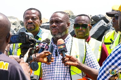Kenneth Gilbert Adjei addressing the press