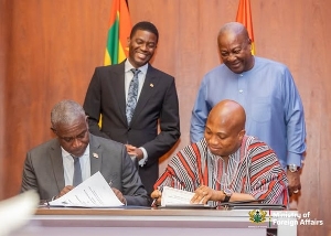 Samuel Okudzeto-Ablakwa signing the MoU for recruitment of nurses to Grenada