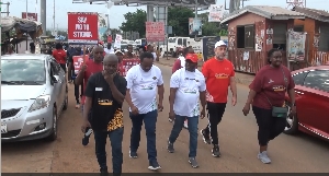 Dr. Kharmacelle Prosper Akanbong leding the walk in Accra