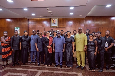 The family in a photograph with Chief of Staff