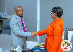 Godwin Eduzi Tamakloe welcoming Oboubia Darko Opoku to NPA