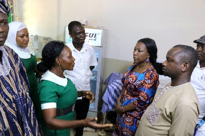 Dr Grace Ayensu-Danquah, Deputy Minister for Health (on the right), talking to a nurse