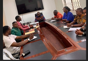 Okai Mintah in a meeting TEIN executives of UEW