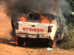 The  burnt Mitsubishi pickup truck with registration number GE 9075-17.