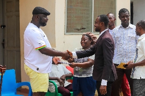 Davis Ansah Opoku doing the presentation to the beneficiaries