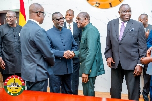 Chief Justice shaking hands with Speaker