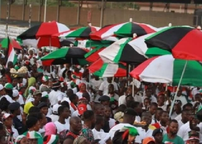 NDC supporters flourishing party colours