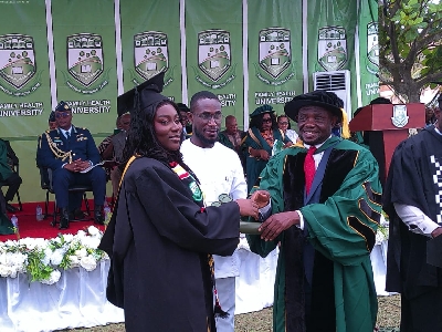 Abest student receiving her award at ceremony